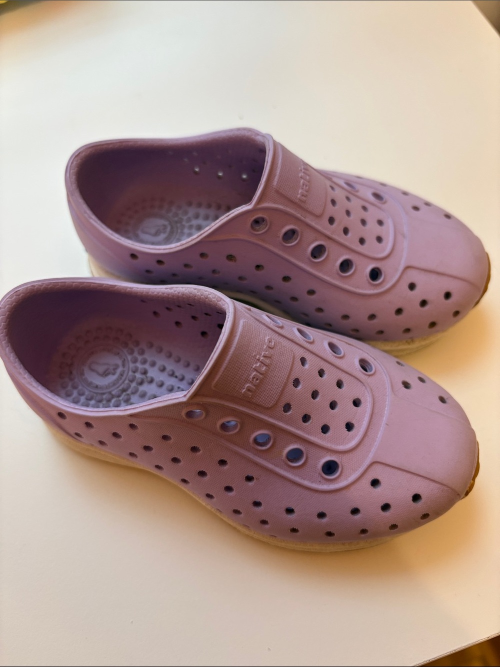 Native Pastel Lilac Slip-On Sneakers with Teal Heel Logo